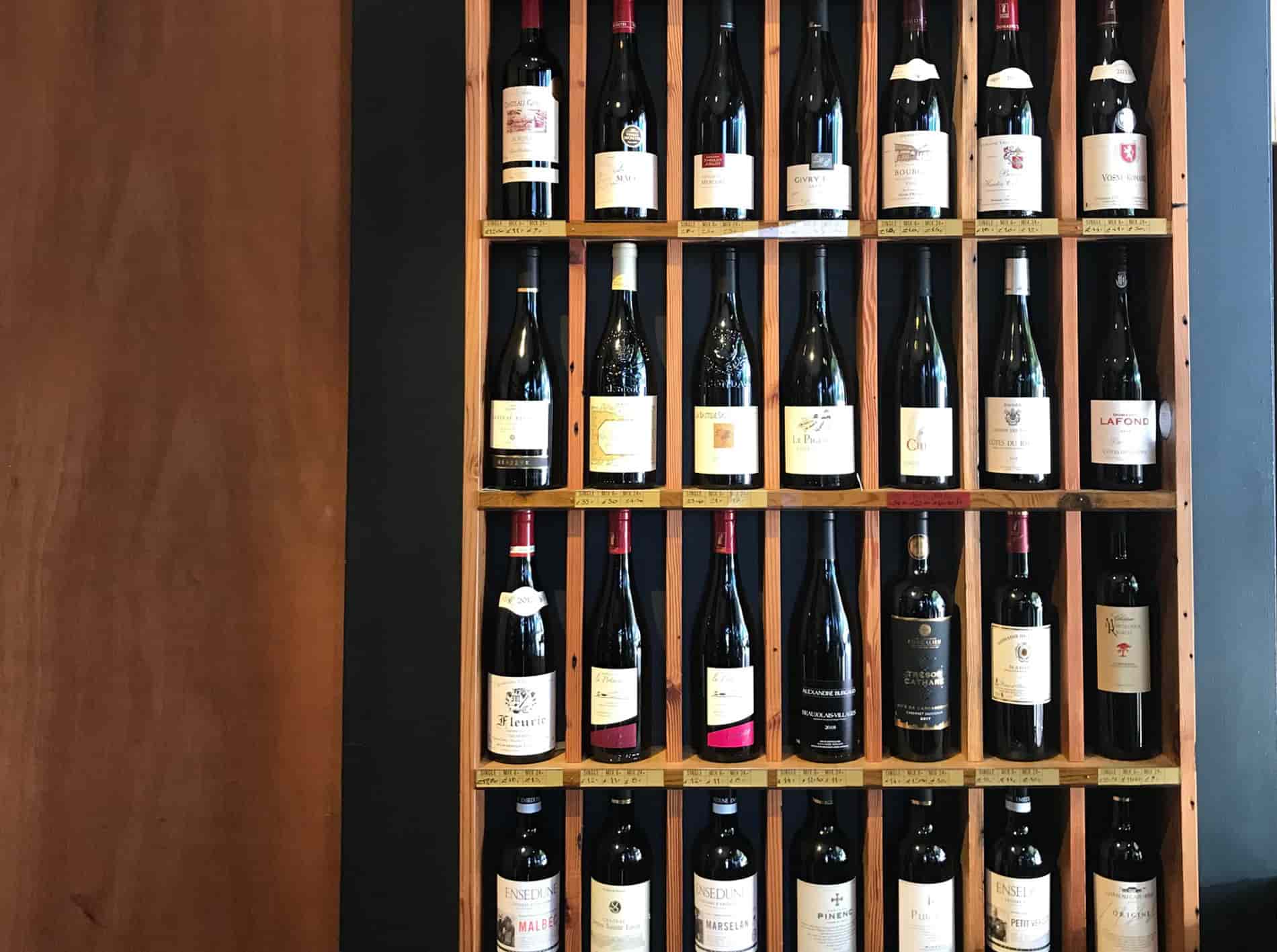 Wine bottles on a rack
